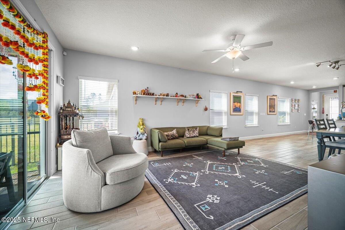 141 Killarney Avenue St. Johns, FL 32259 - Photo 10 of 33 a living room with furniture and a table