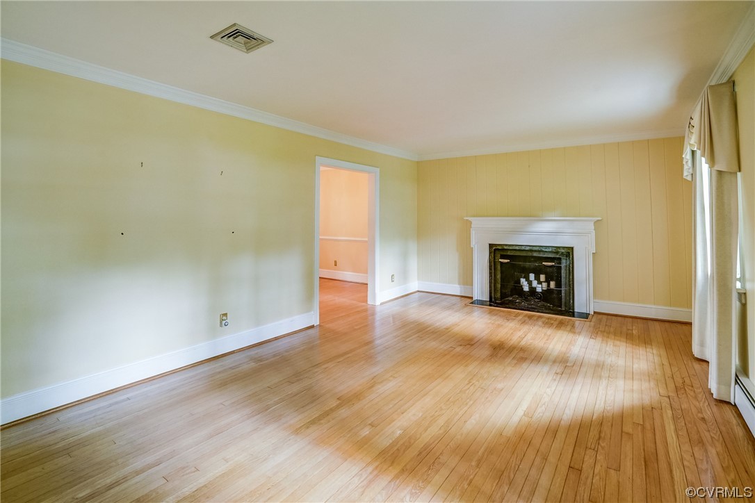 3700 Whitewood Road Richmond, VA 23235 - Photo 3 of 19 Spacious living room with hardwood floors, crown molding and fireplace with mantle
