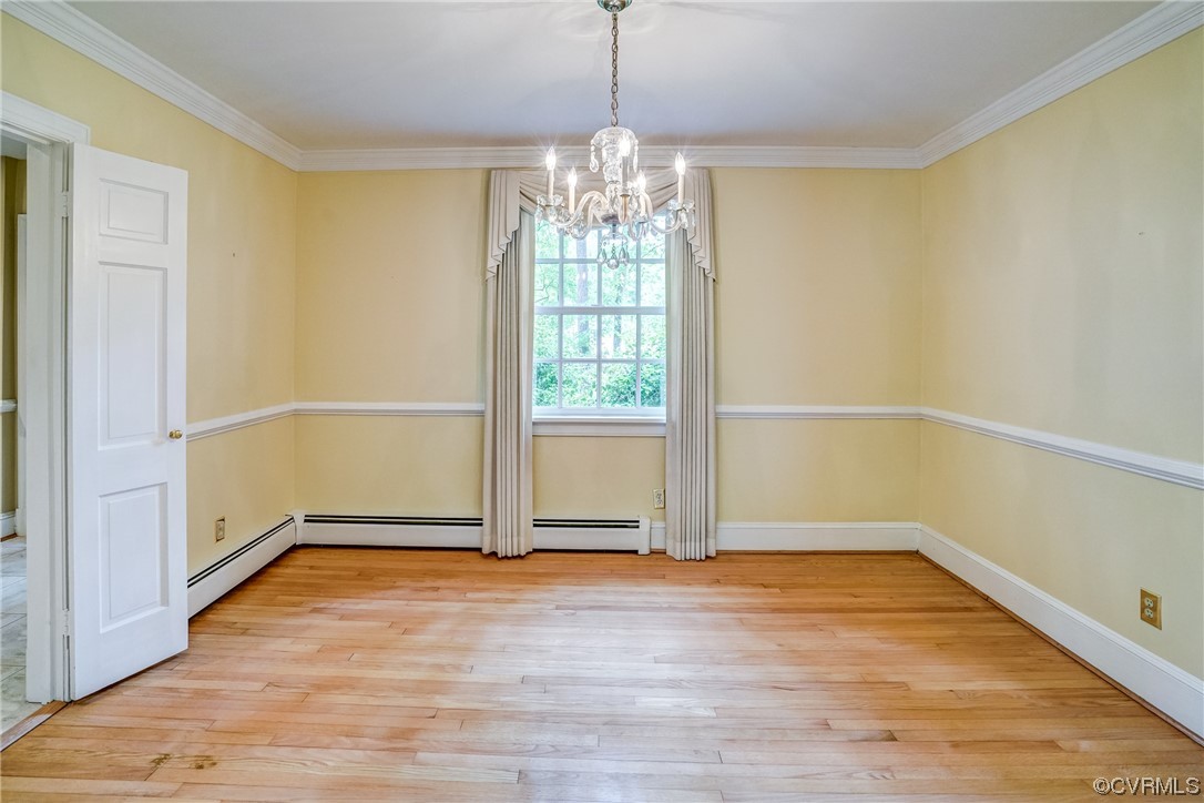 3700 Whitewood Road Richmond, VA 23235 - Photo 5 of 19 Formal dining room has hardwood floors, crown molding and chair rail