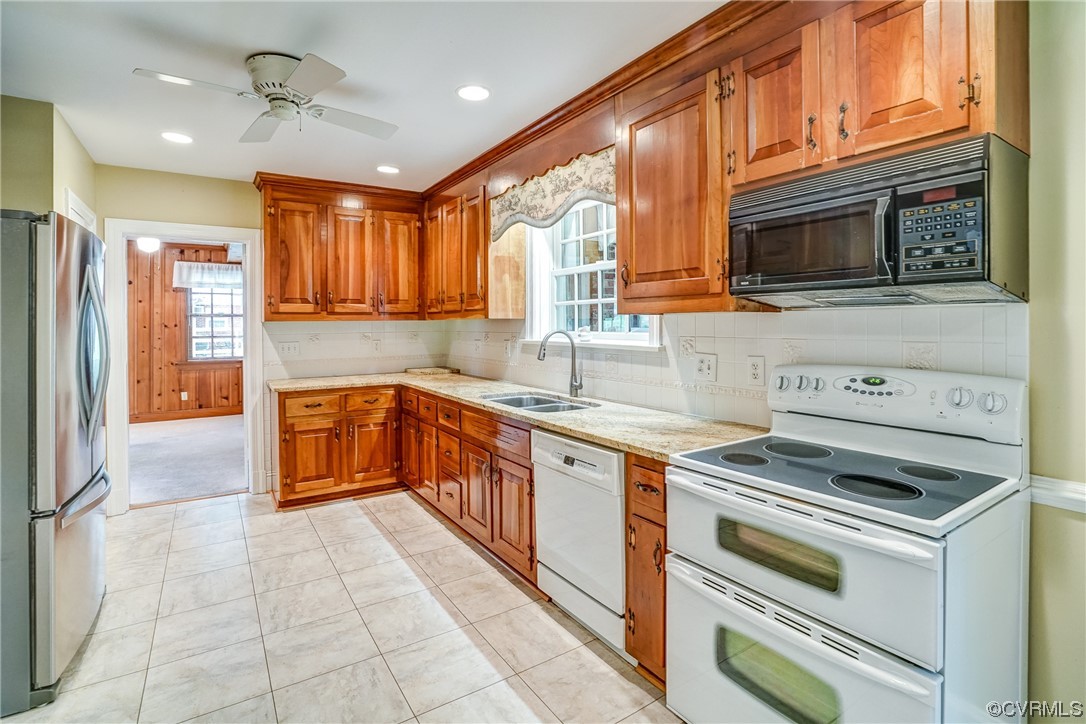 3700 Whitewood Road Richmond, VA 23235 - Photo 10 of 19 Kitchen is spacious with granite countertops, wood cabinets and plenty of cabinet and counter space