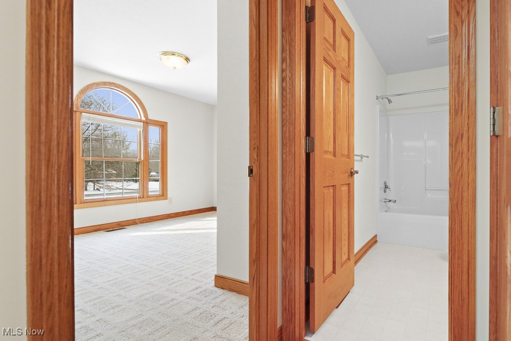 4808 Sherman Road Kent, OH 44240 - Photo 20 of 50 Hallway with baseboards and light flooring