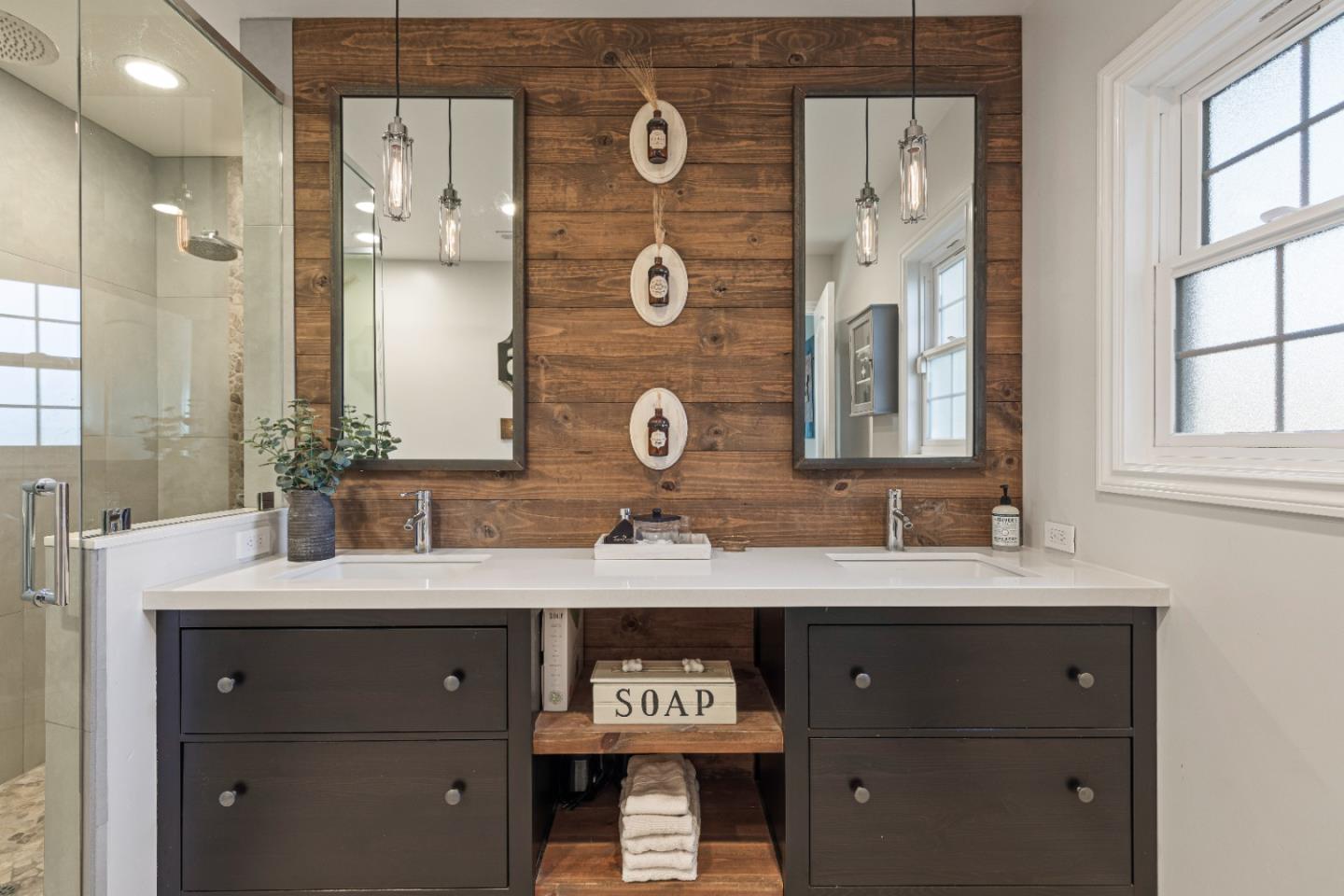 9735 New Avenue Gilroy, CA 95020 - Photo 13 of 52 a bathroom with a granite countertop sink and a mirror