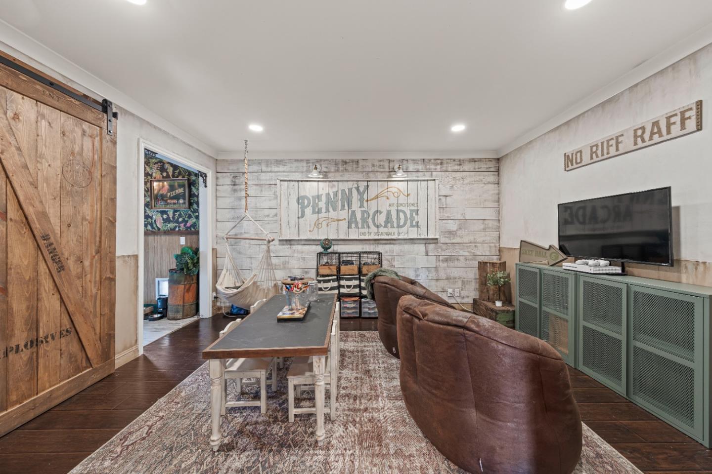 9735 New Avenue Gilroy, CA 95020 - Photo 20 of 52 a living room with furniture and a flat screen tv