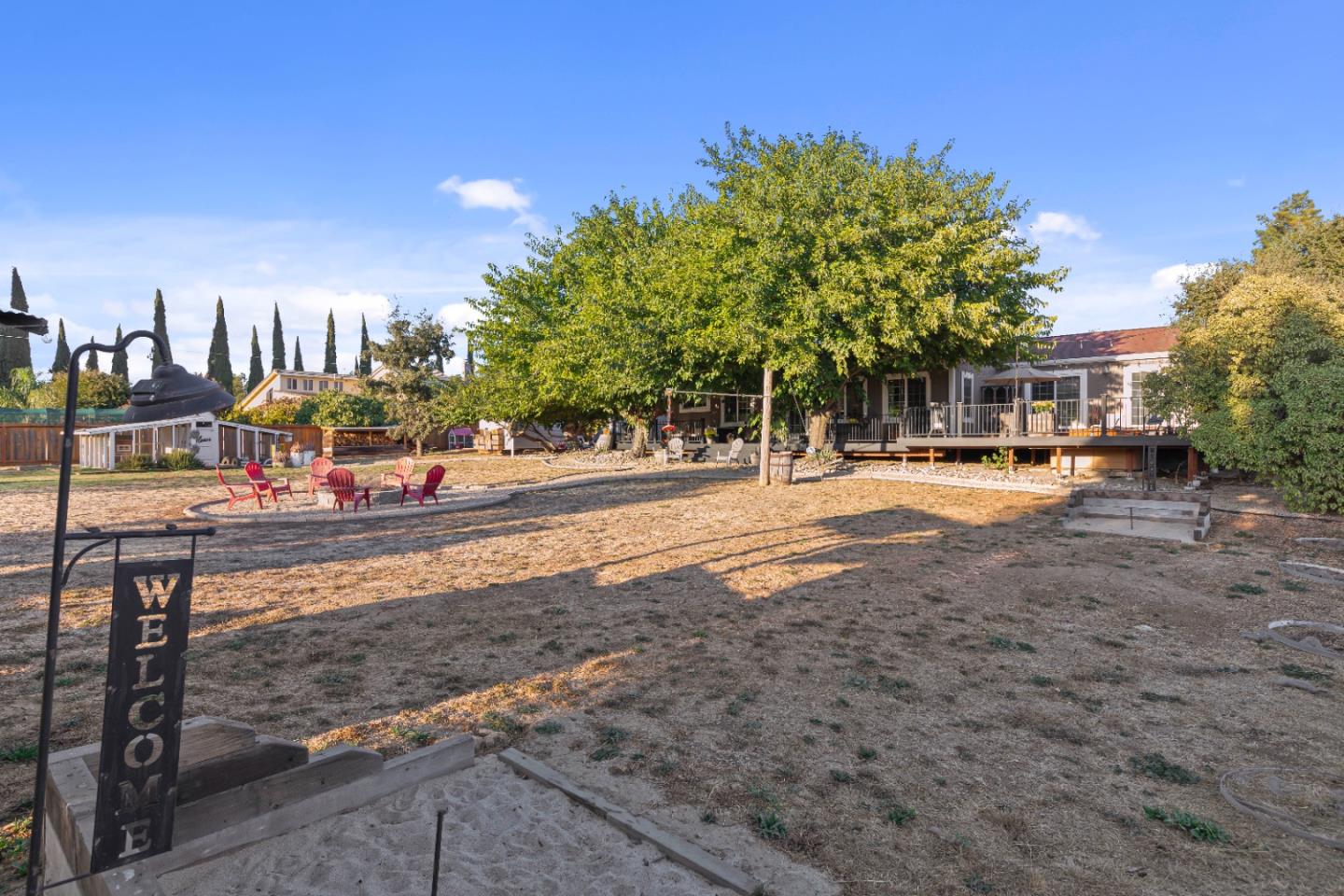 9735 New Avenue Gilroy, CA 95020 - Photo 33 of 52 a view of a park with swings and slides