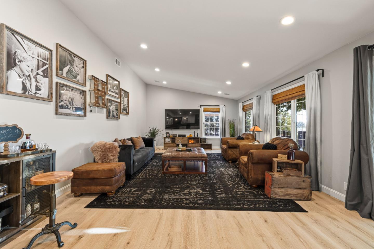 9735 New Avenue Gilroy, CA 95020 - Photo 8 of 52 a living room with furniture or couch and a flat screen tv