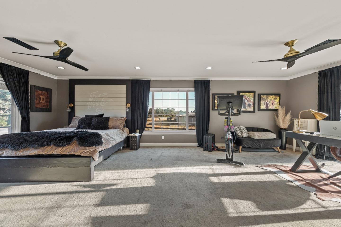 9735 New Avenue Gilroy, CA 95020 - Photo 10 of 52 a living room with furniture and a flat screen tv