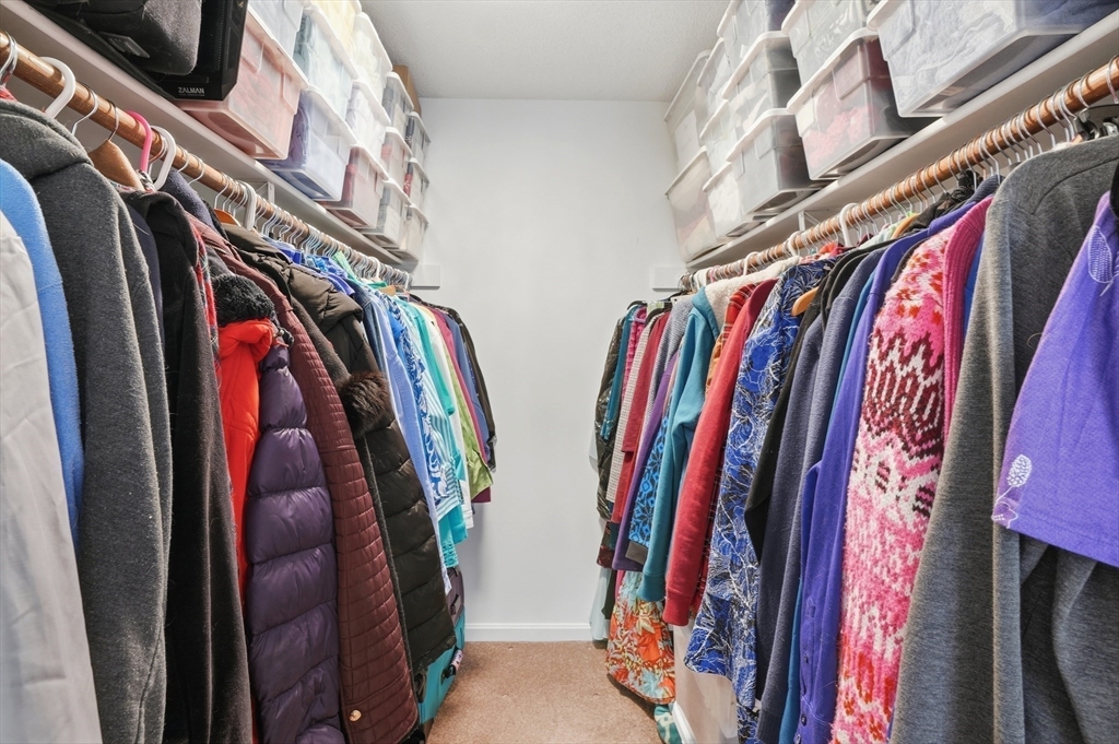 17 Longley Road Shirley, MA 01464 - Photo 13 of 33 a view of walk in closet with clothes
