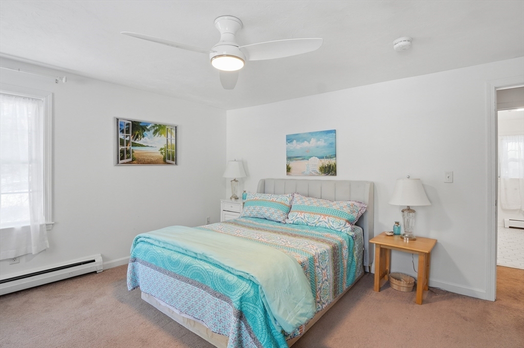 17 Longley Road Shirley, MA 01464 - Photo 16 of 33 a bedroom with a bed and a window