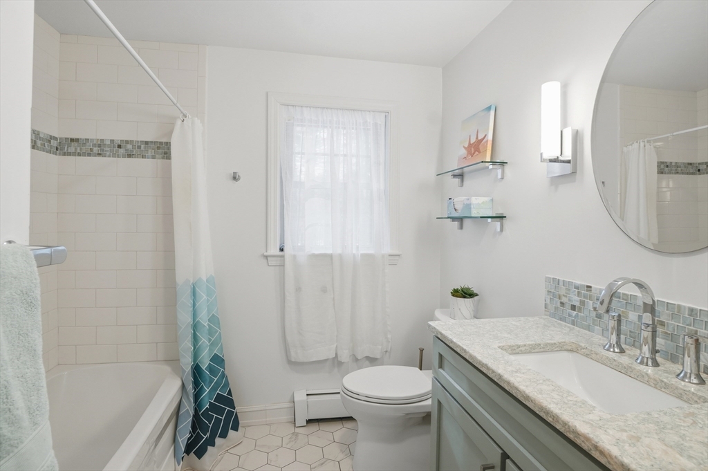 17 Longley Road Shirley, MA 01464 - Photo 20 of 33 a bathroom with a granite countertop sink toilet and shower