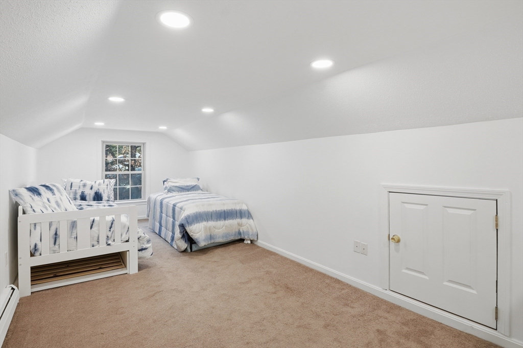 17 Longley Road Shirley, MA 01464 - Photo 21 of 33 a spacious bedroom with a bed and a cabinets