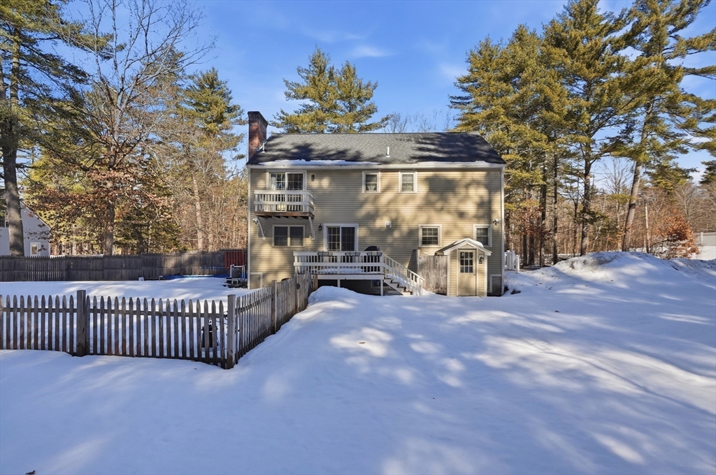 17 Longley Road Shirley, MA 01464 - Photo 23 of 33 a view of a porch with furniture and a tree