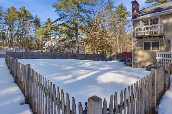 a view of an outdoor space and deck front of house
