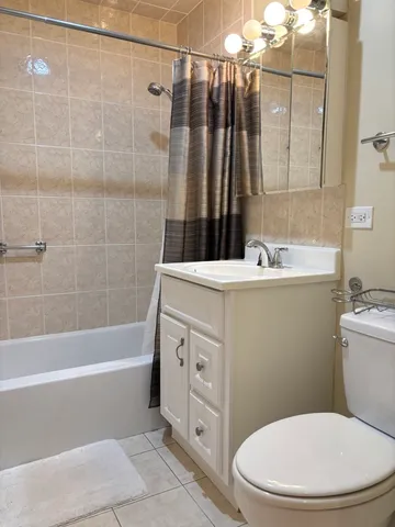 a view of living room with furniture and window