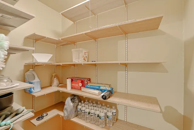 a kitchen with a stove and a refrigerator