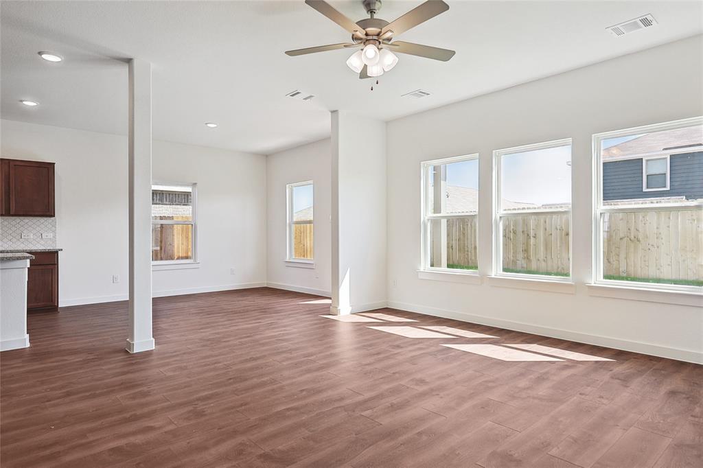 213 Patton Lane Venus, TX 76084 - Photo 14 of 30 Unfurnished living room with ceiling fan, dark wood-style flooring, and recessed lighting