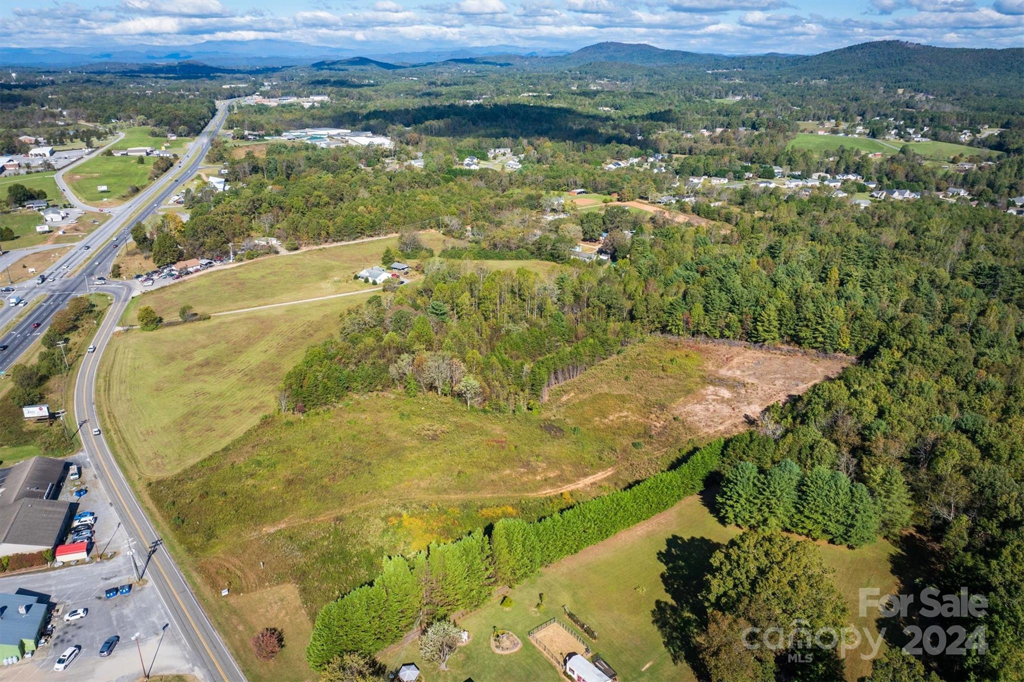 4054 Lower Cedar Valley Road Hudson, NC 28638 - Photo 5 of 15 an aerial view of residential houses with outdoor space