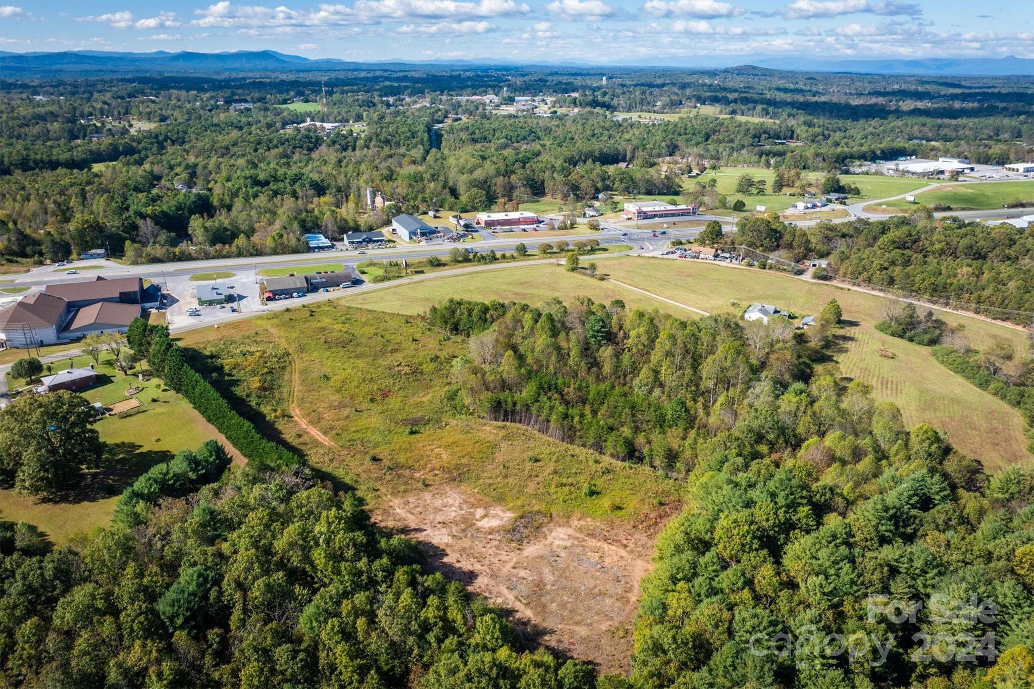 4054 Lower Cedar Valley Road Hudson, NC 28638 - Photo 7 of 15 a view of a swimming pool with a yard