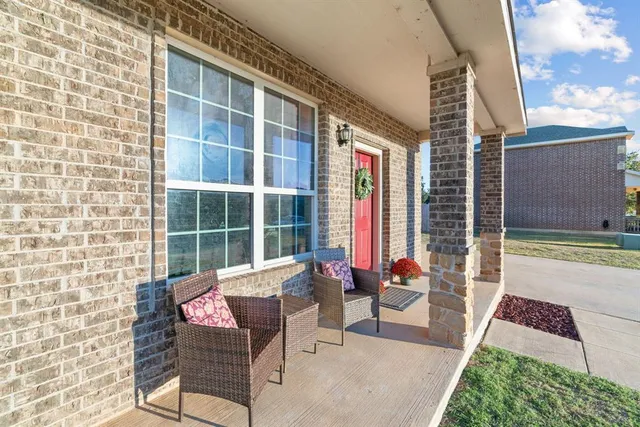 a building outdoor space with patio furniture