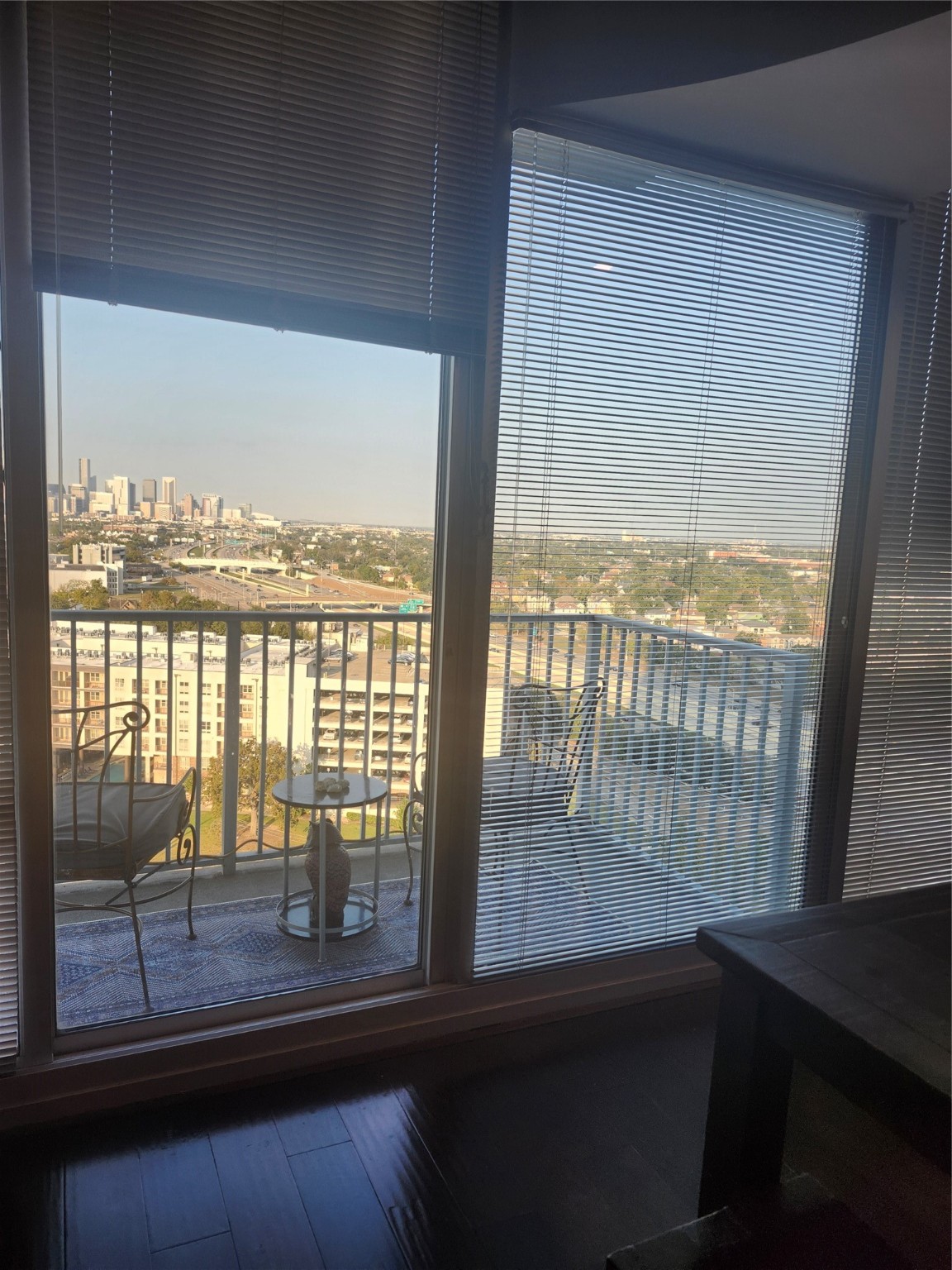 5925 Almeda Road, Unit 11513 Houston, TX 77004 - Photo 24 of 26 a view of a room with wooden floor and a floor to ceiling window