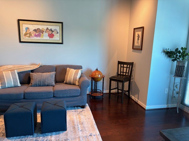 5925 Almeda Road, Unit 11513 Houston, TX 77004 - Photo 9 of 26 a living room with furniture and wooden floor