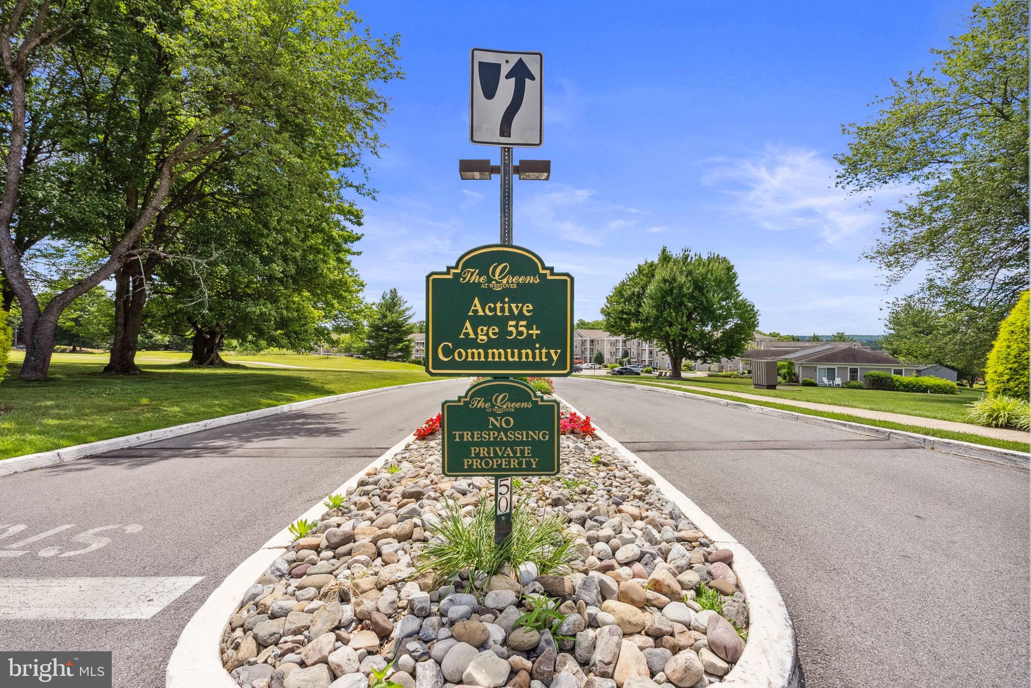 223 Brandon Road Eagleville, PA 19403 - Photo 2 of 38 a view of a street with a building in the background