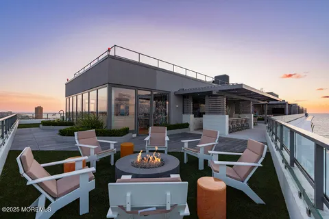 an outdoor space with patio furniture