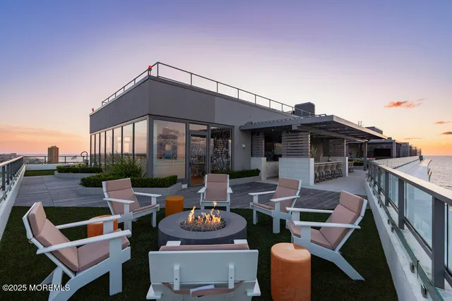 an outdoor space with patio furniture