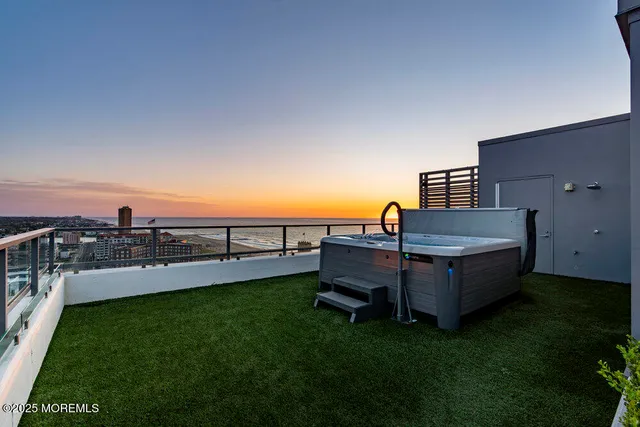 a view of staircase with lots of trees and plants
