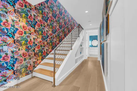 a large kitchen with a table chairs stove and kitchen view