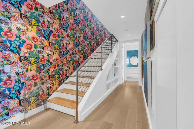 a large kitchen with a table chairs stove and kitchen view