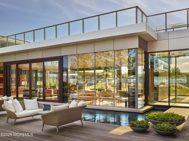 a black and white photo of a living room