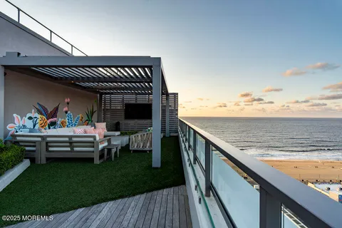 a kitchen with a chair and chairs