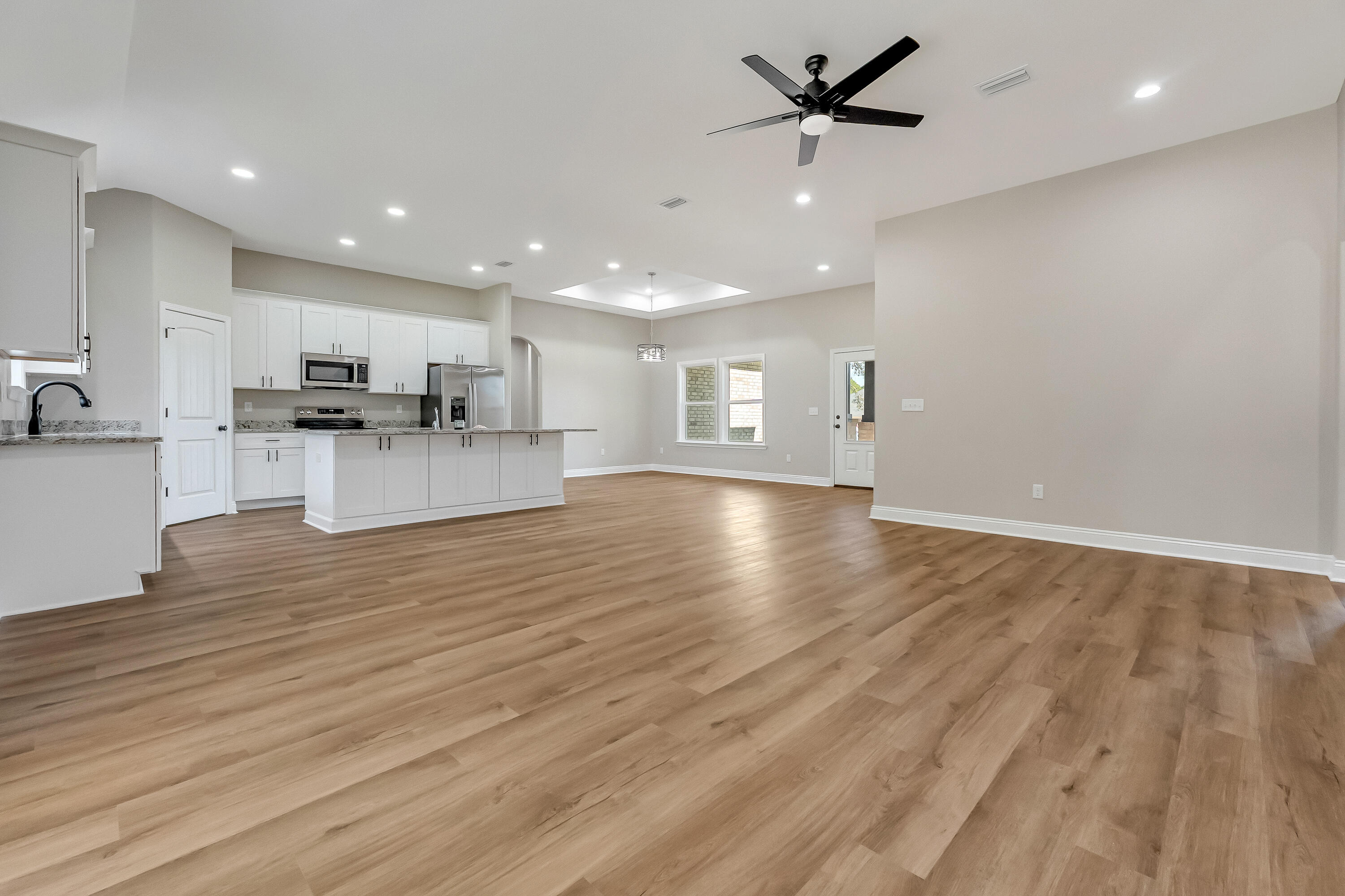 5840 Phillip Road Crestview, FL 32539 - Photo 12 of 59 a view of kitchen with cabinets and wooden floor