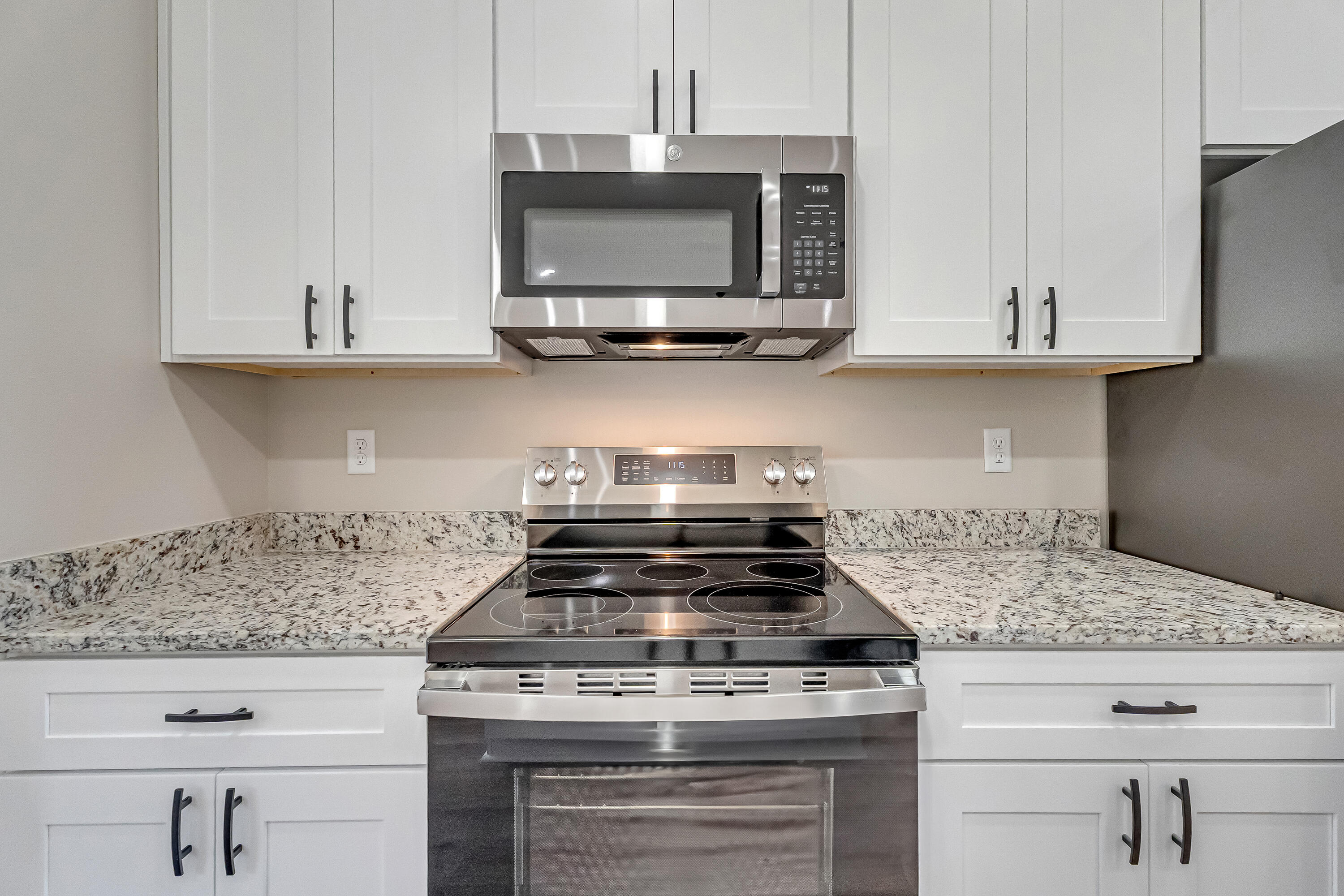 5840 Phillip Road Crestview, FL 32539 - Photo 20 of 59 a stove top oven sitting inside of a kitchen