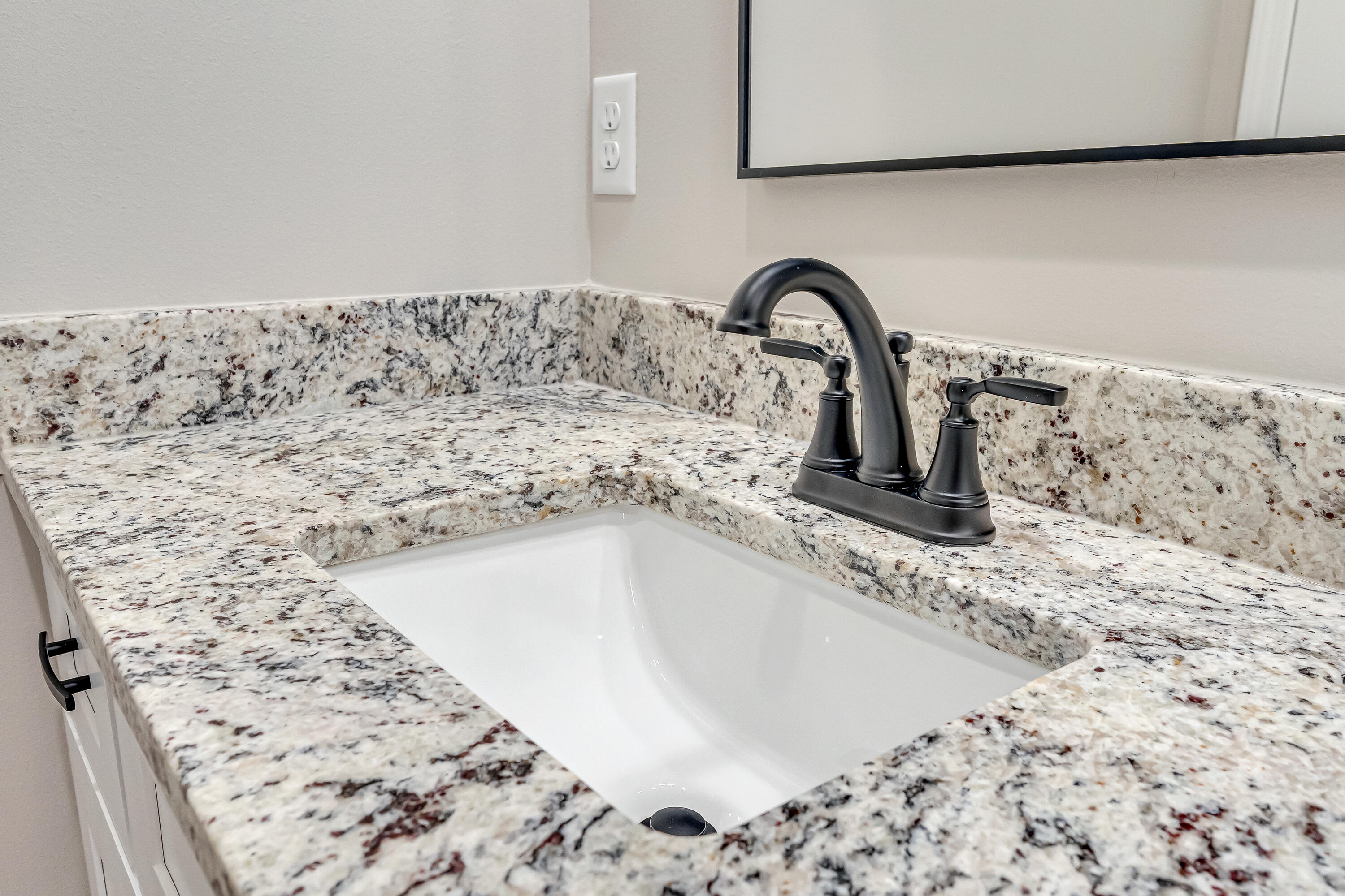 5840 Phillip Road Crestview, FL 32539 - Photo 43 of 59 a close view of a sink a faucet a window and a refrigerator