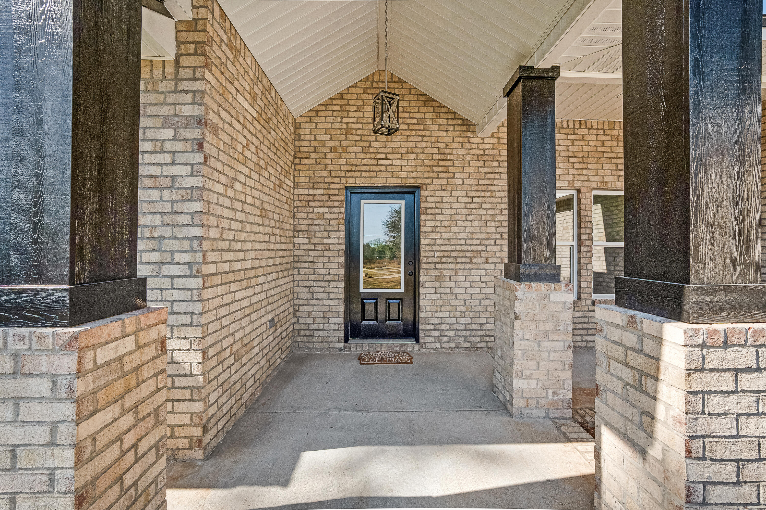 5840 Phillip Road Crestview, FL 32539 - Photo 7 of 59 a view of a brick house with windows
