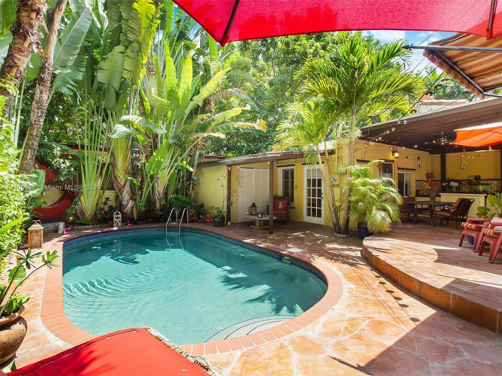 168 Northeast 44th Street Miami, FL 33137 - Photo 15 of 19 a view of a backyard with a patio