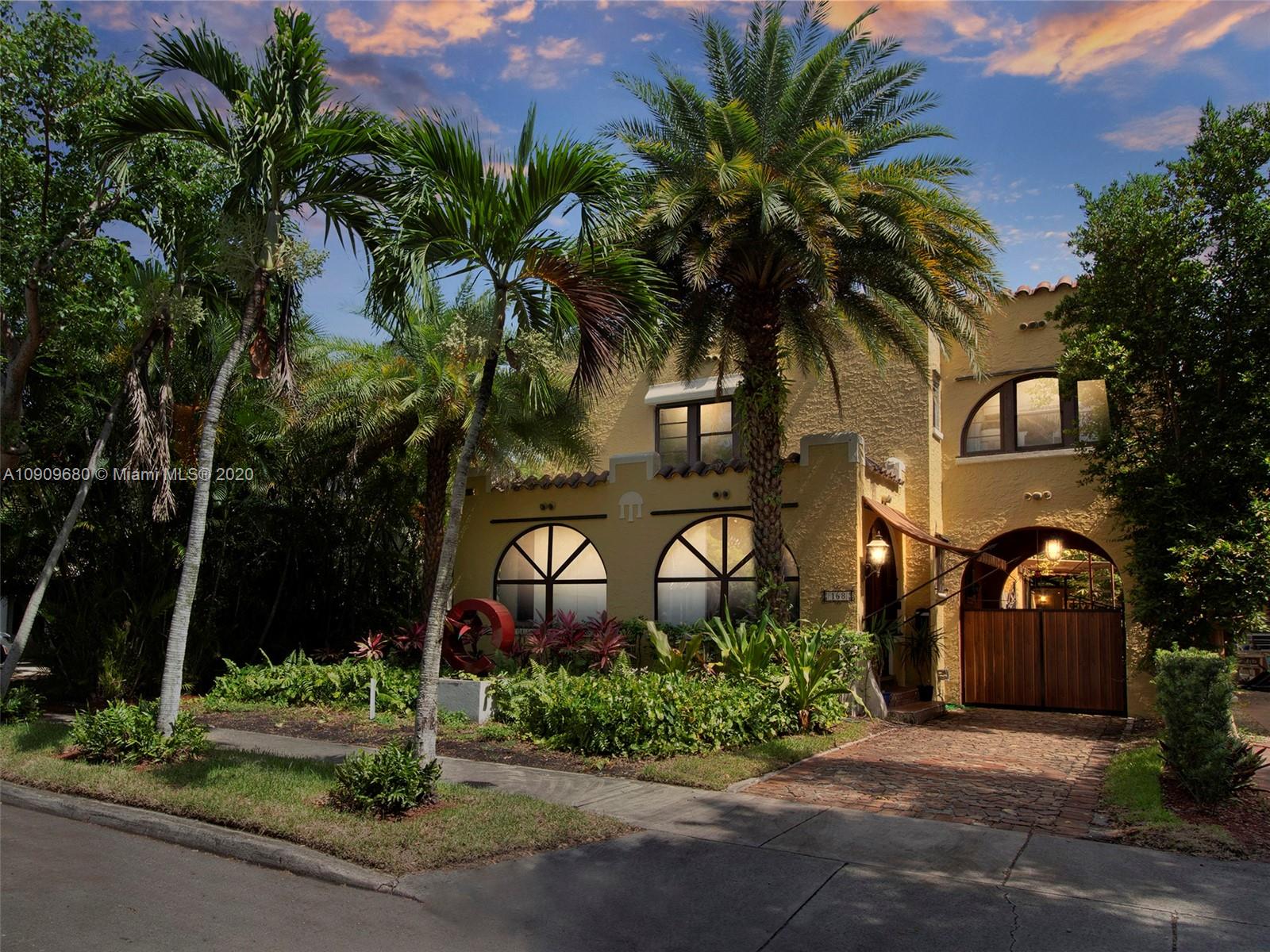 168 Northeast 44th Street Miami, FL 33137 - Photo 19 of 19 a front view of a house with garden