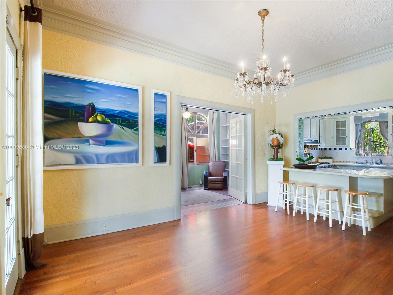 168 Northeast 44th Street Miami, FL 33137 - Photo 5 of 19 a view of a living room and chandelier