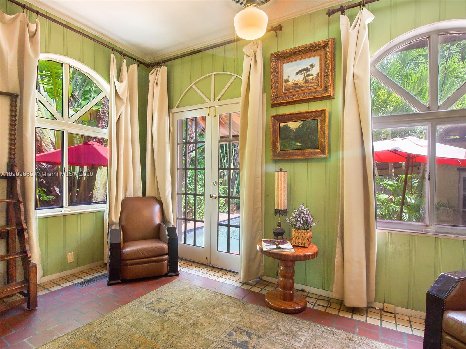 168 Northeast 44th Street Miami, FL 33137 - Photo 8 of 19 a living room with furniture and a window