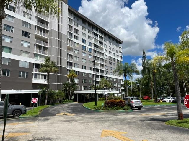 a view of a building with a street