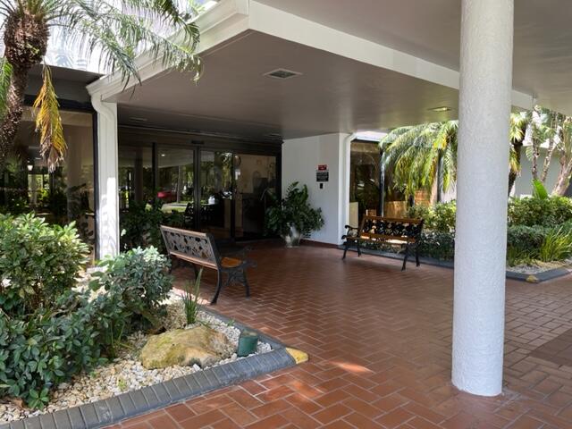 3850 Washington Street, Unit 405 Hollywood, FL 33021 - Photo 3 of 14 a view of a house with backyard porch and sitting area