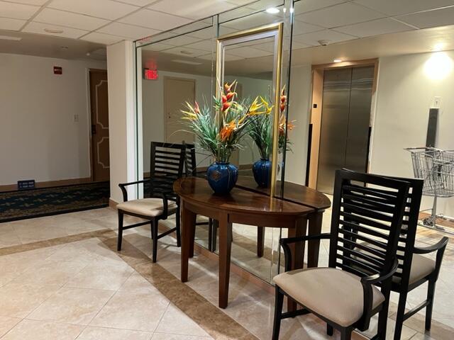 3850 Washington Street, Unit 405 Hollywood, FL 33021 - Photo 4 of 14 a dining room with furniture and wooden floor