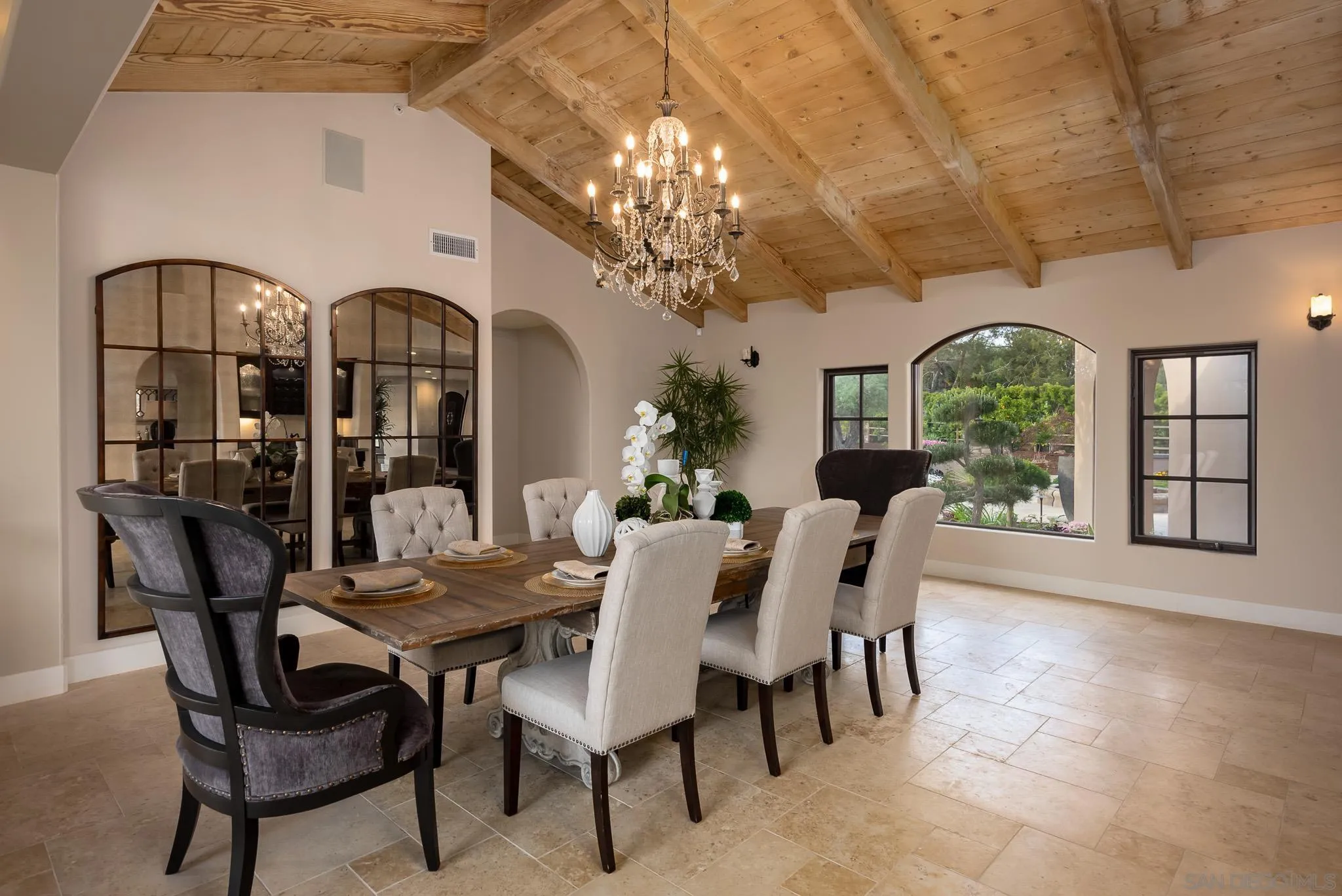 16738 Zumaque Street Rancho Santa Fe, CA 92067 - Photo 15 of 61 a view of a dining room with furniture and chandelier