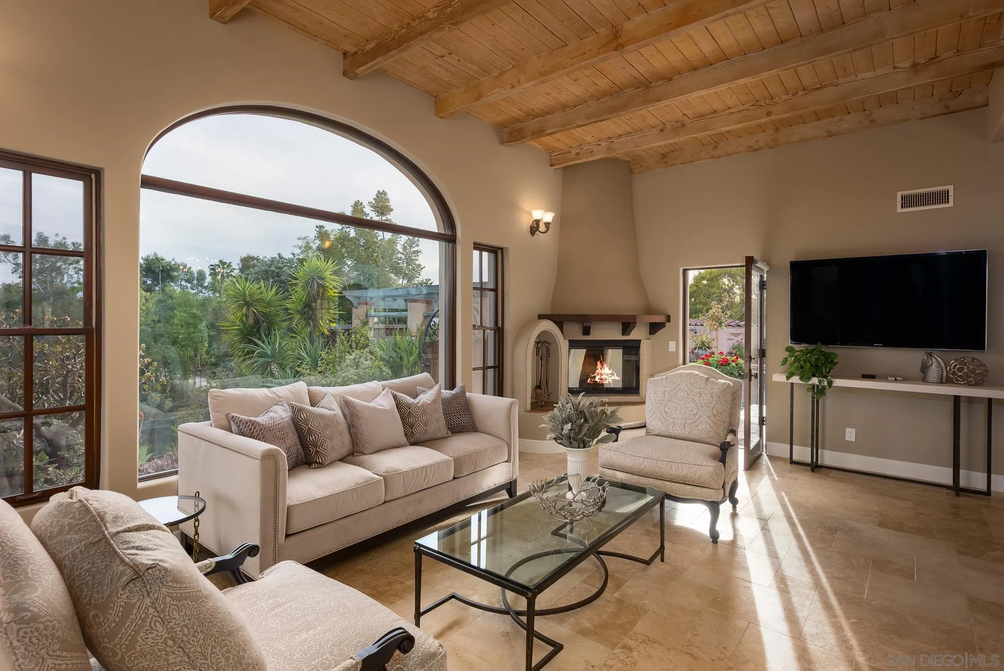 16738 Zumaque Street Rancho Santa Fe, CA 92067 - Photo 17 of 61 a living room with furniture and a flat screen tv
