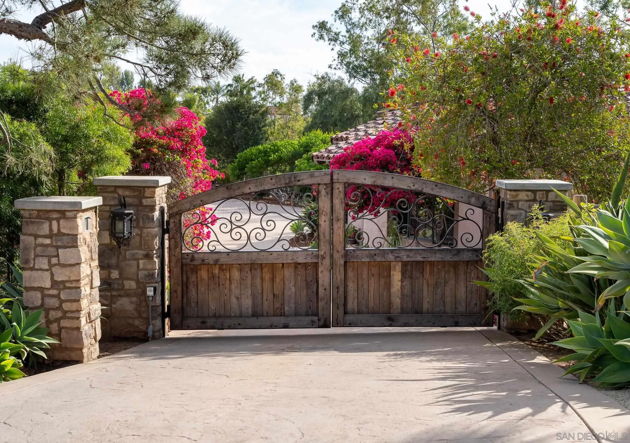 16738 Zumaque Street Rancho Santa Fe, CA 92067 - Photo 2 of 61 a front view of a house with a yard