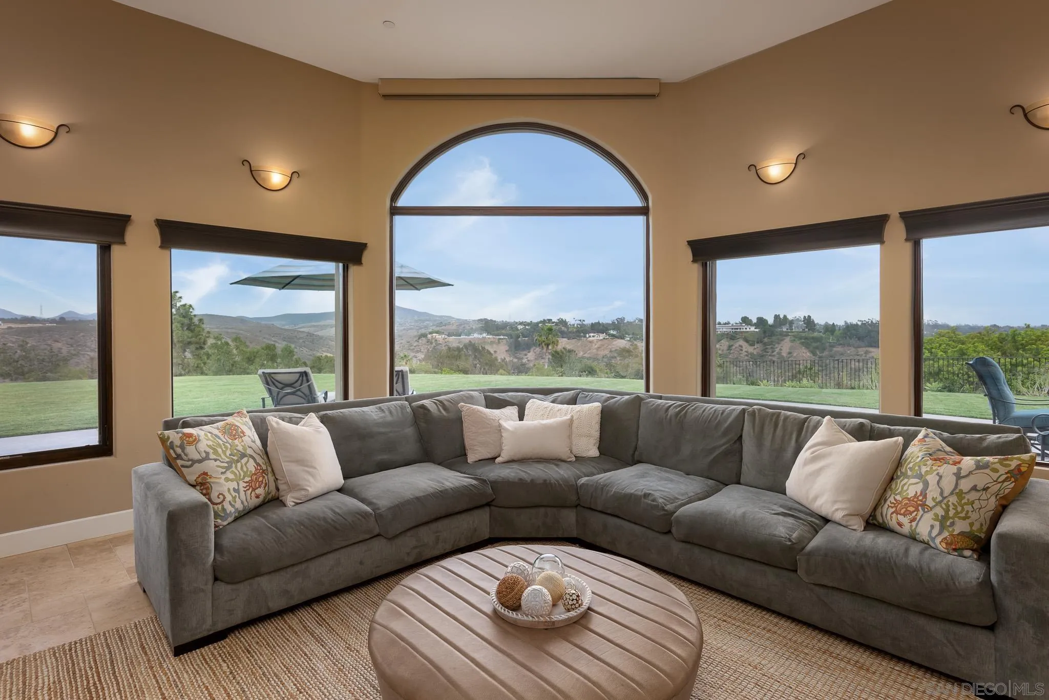 16738 Zumaque Street Rancho Santa Fe, CA 92067 - Photo 23 of 61 a living room with furniture and a large window