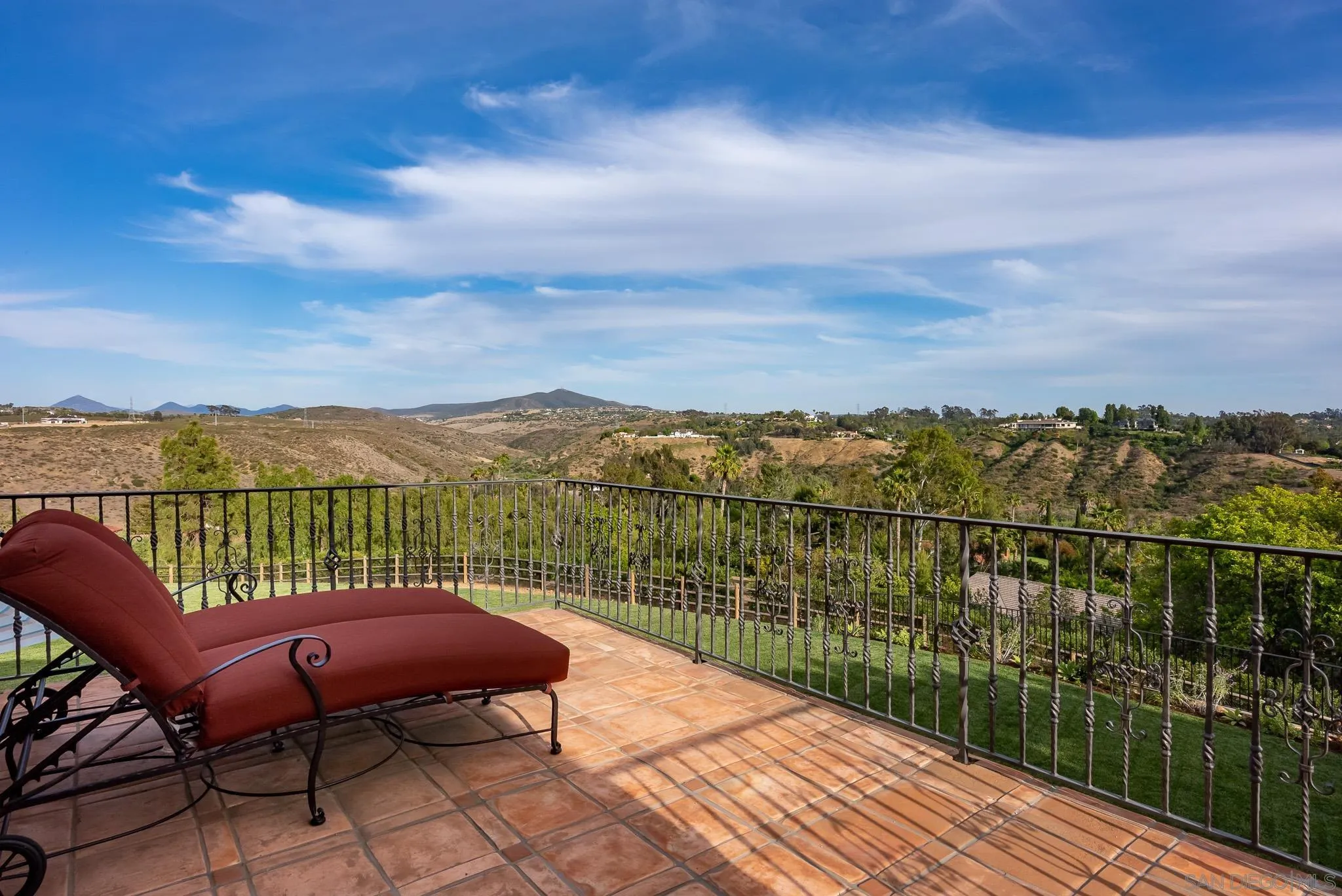 16738 Zumaque Street Rancho Santa Fe, CA 92067 - Photo 31 of 61 a view of a terrace with a lake view