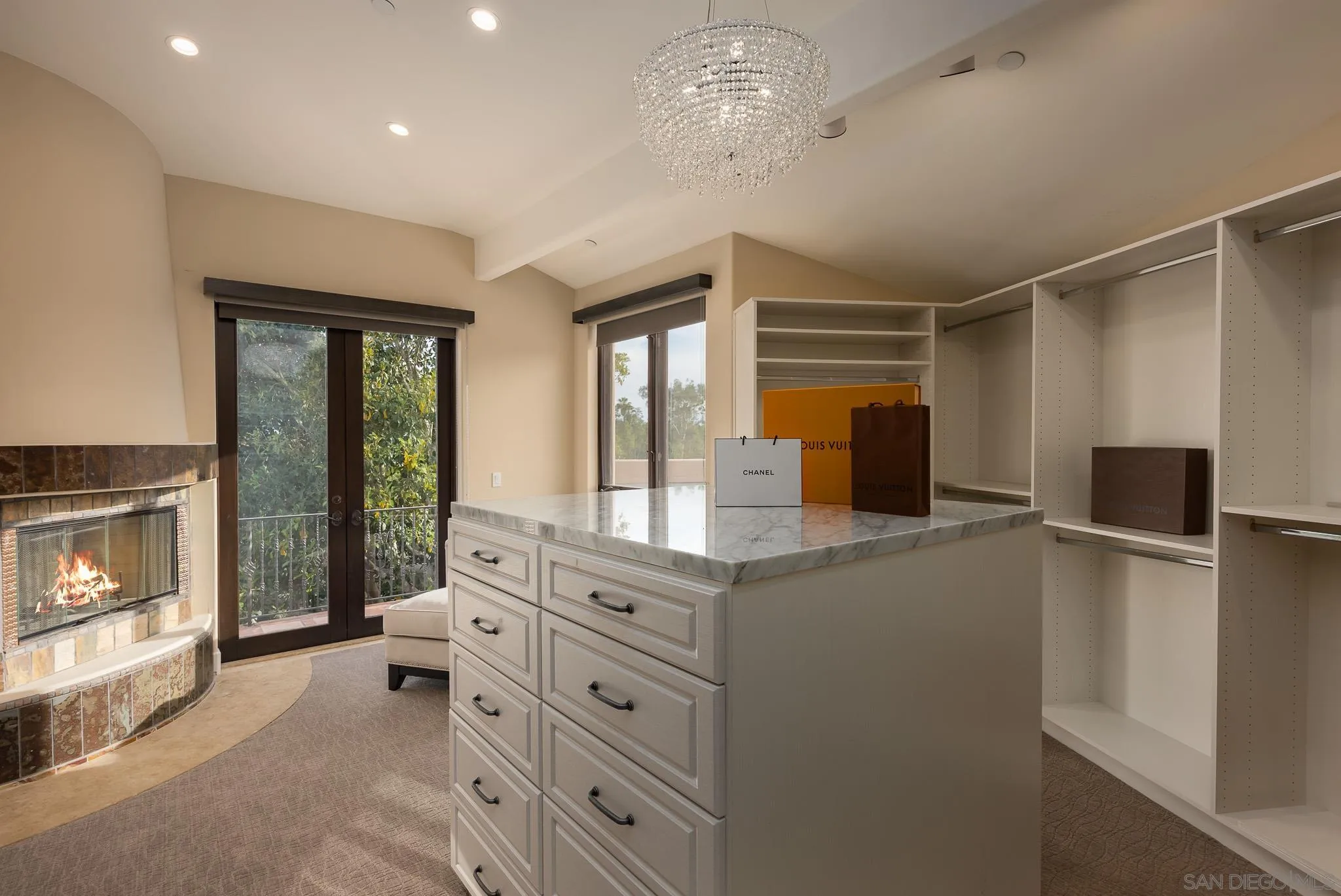 16738 Zumaque Street Rancho Santa Fe, CA 92067 - Photo 32 of 61 a spacious bathroom with a double vanity sink a mirror and a shower