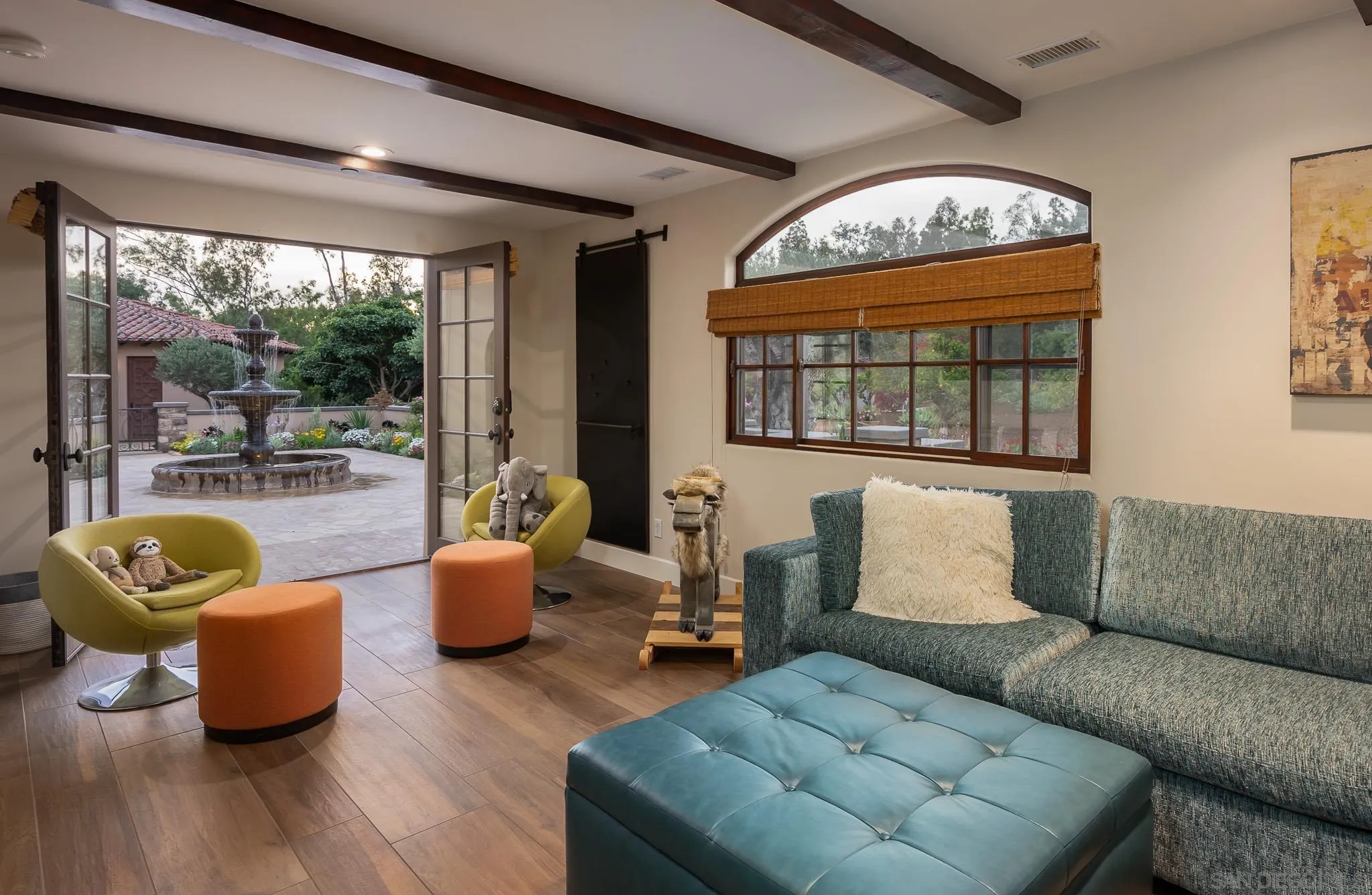 16738 Zumaque Street Rancho Santa Fe, CA 92067 - Photo 33 of 61 a living room with furniture and a large window